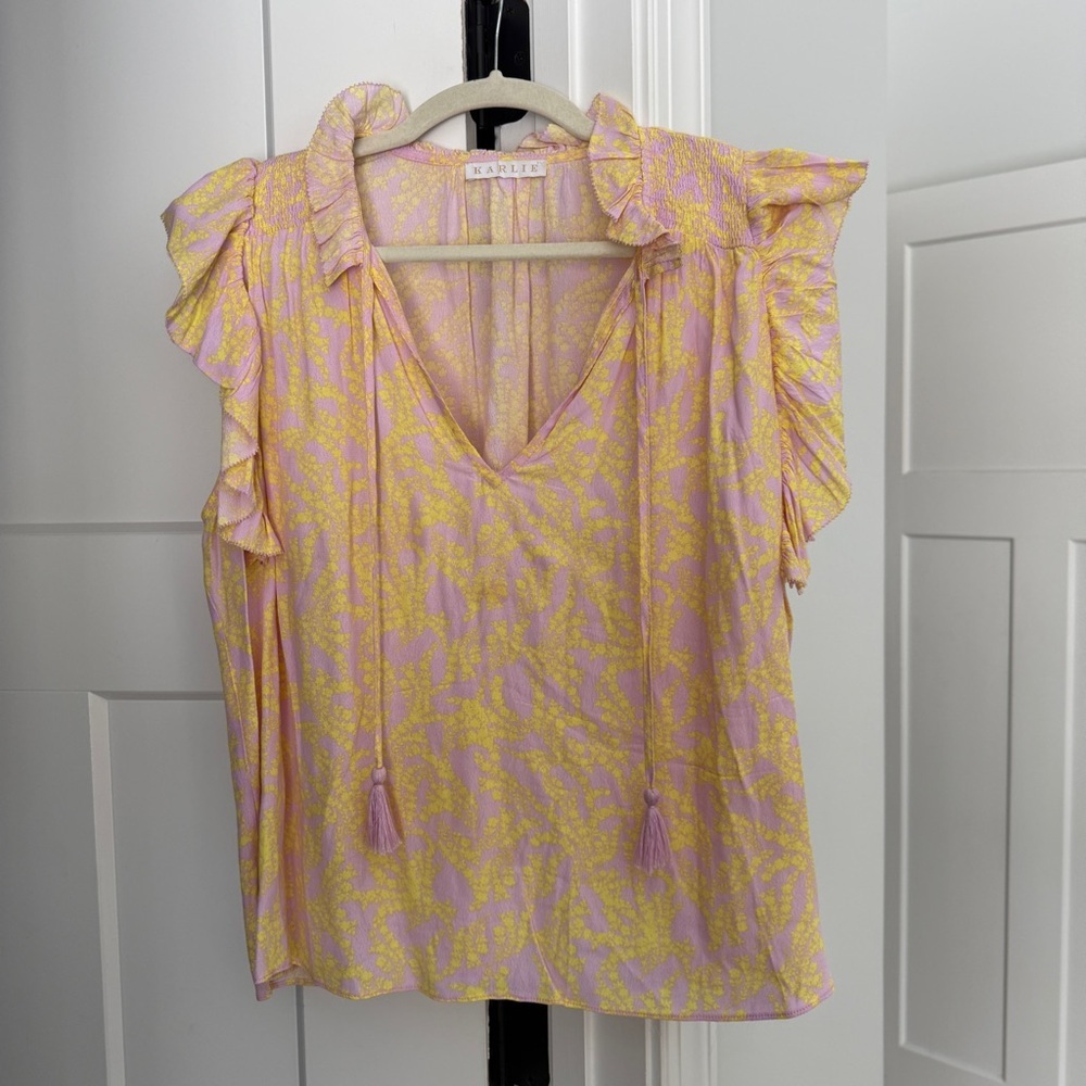 Karlie Pink Yellow Ruffle Blouse smocked shoulder v neck tassel top